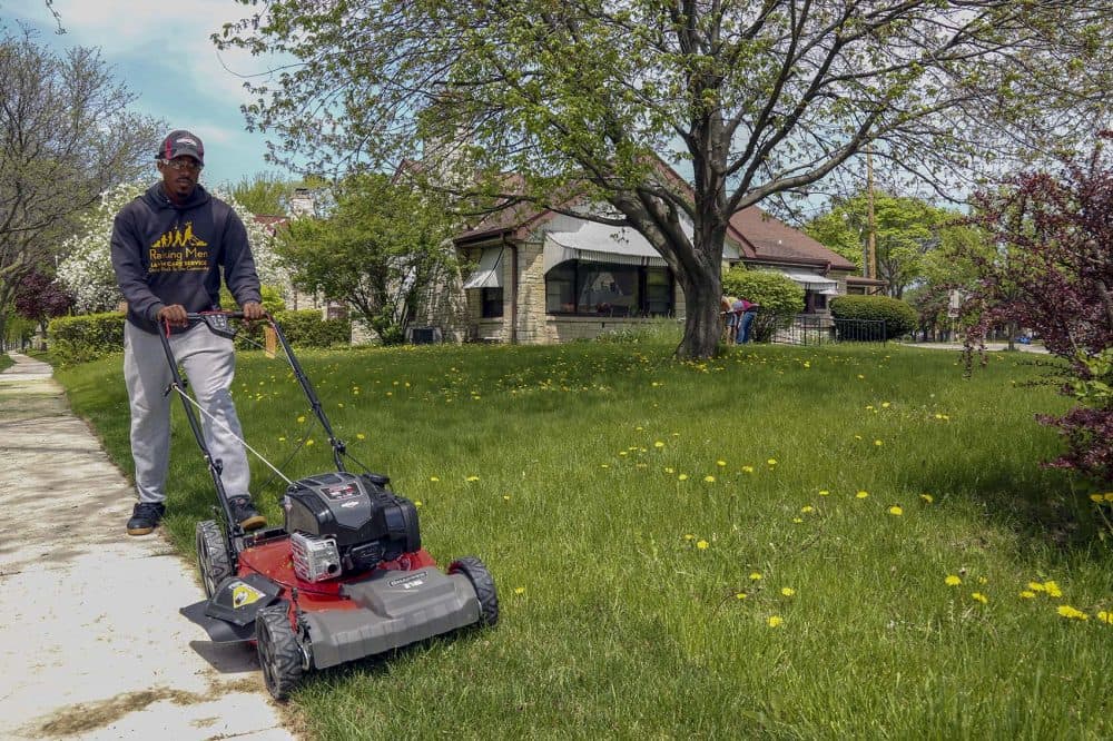 Rodney Smith Jr. mowing the first lawn on his 50-state trip. (Courtesy 50 States 50 Lawns)