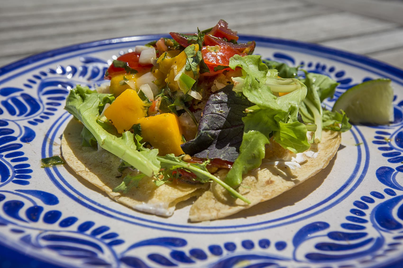 Fish tacos with mango salsa and lime cream. (Jesse Costa/WBUR)