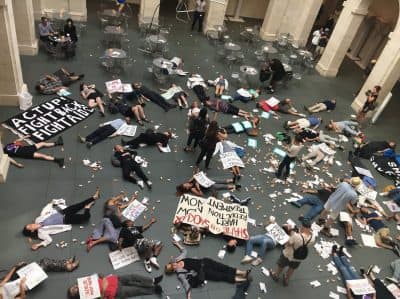 Protesters Stage 'Die-In' At Harvard Museum To Criticize Namesake's Link To Opioid Crisis