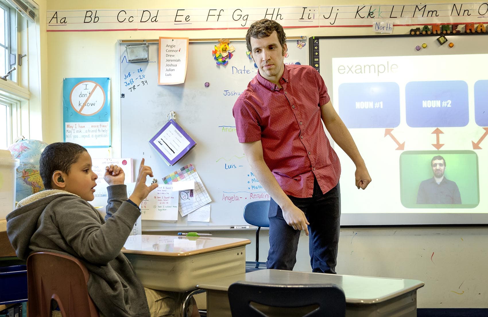 Teacher Mike Olivier engages his second graders at The Learning Center For The Deaf. (Robin Lubbock/WBUR)