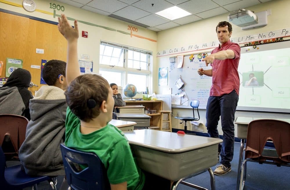 Olivier engages students at his second grade class. (Robin Lubbock/WBUR)