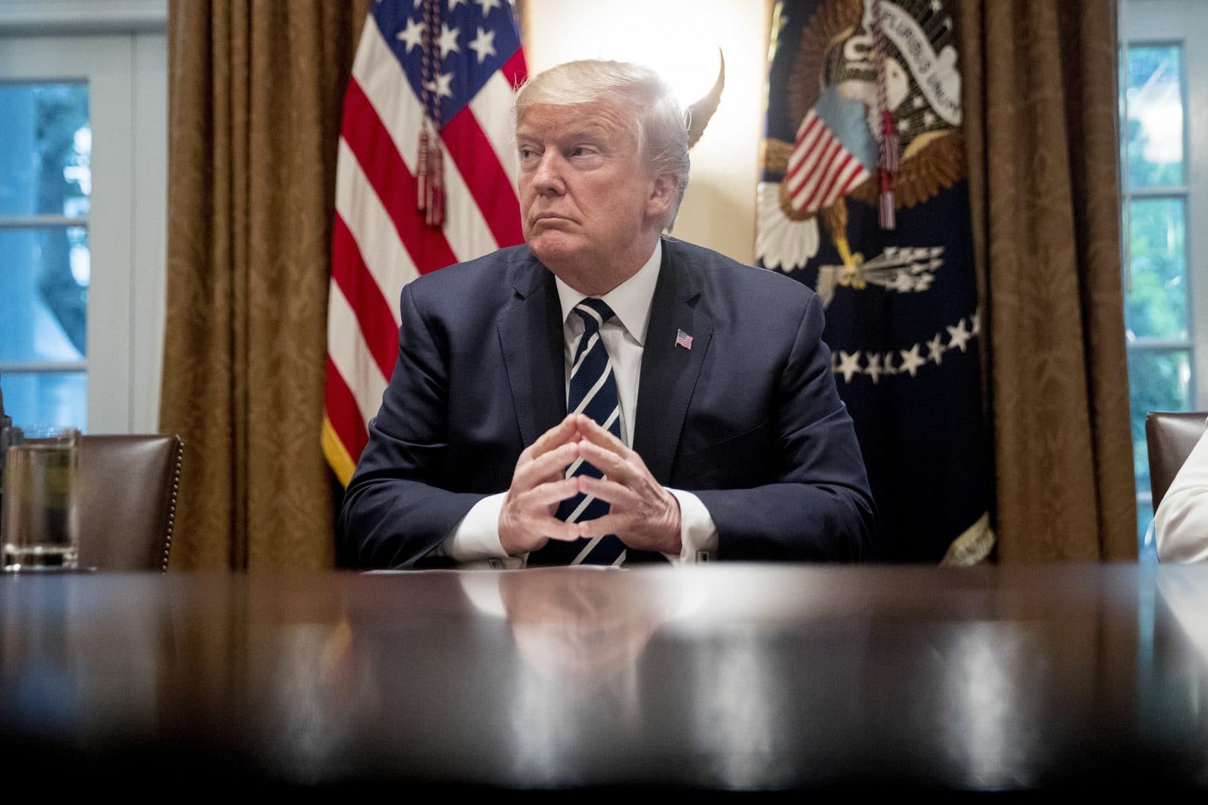 President Donald Trump waits for members of the media get set up before speaking in the Cabinet room of the White House, Tuesday, July 17, 2018, in Washington. (Andrew Harnik/AP)