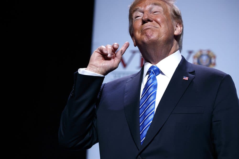 President Donald Trump gestures to music as he arrives to speak to the Veterans of Foreign Wars of the United States National Convention Tuesday, July 24, 2018, in Kansas City, Mo. (Evan Vucci/AP)