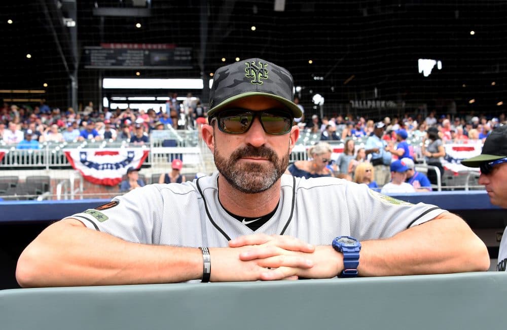Mets manager Mickey Callaway joined his team in wearing black wristbands on Memorial Day to honor fallen soldiers. (Scott Cunningham/Getty Images)