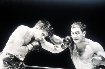 Rocky Marciano lands a right hand on his way to beating Roland La Starza in their 1953 Heavyweight Title fight in New York. (Allsport Hulton Archive/Keystone/Getty Images)