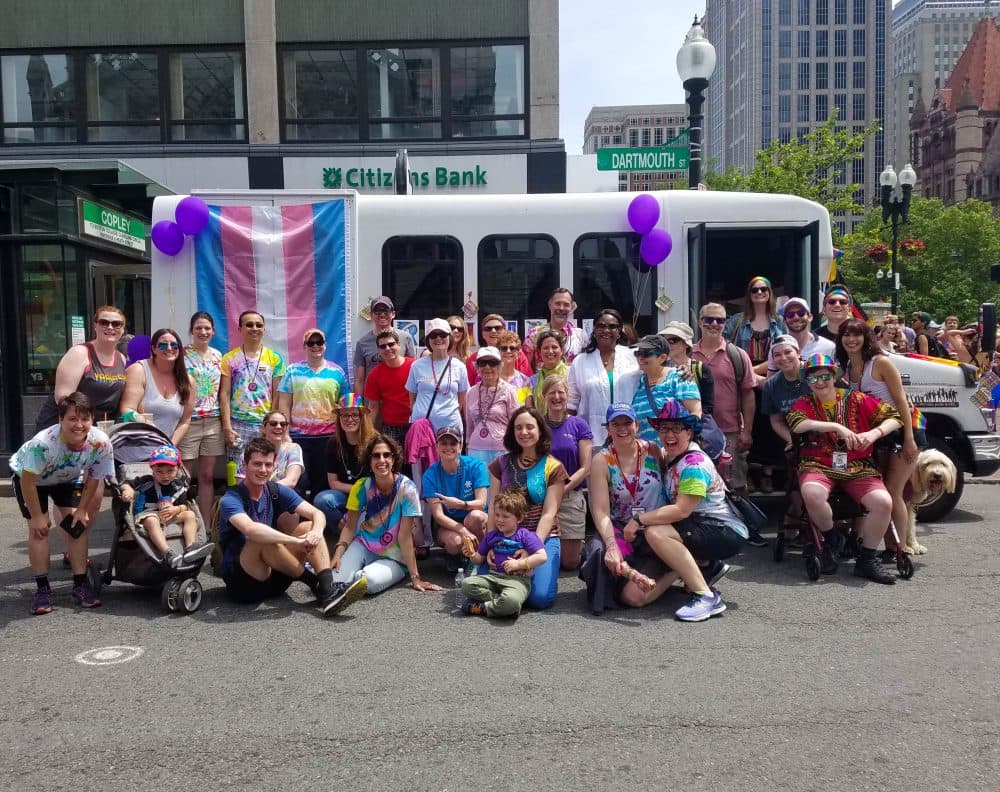 HSL residents, staff and supporters at 2018 Boston Pride. Chris is sitting on right wearing rainbow hat. (Courtesy Hebrew SeniorLife)