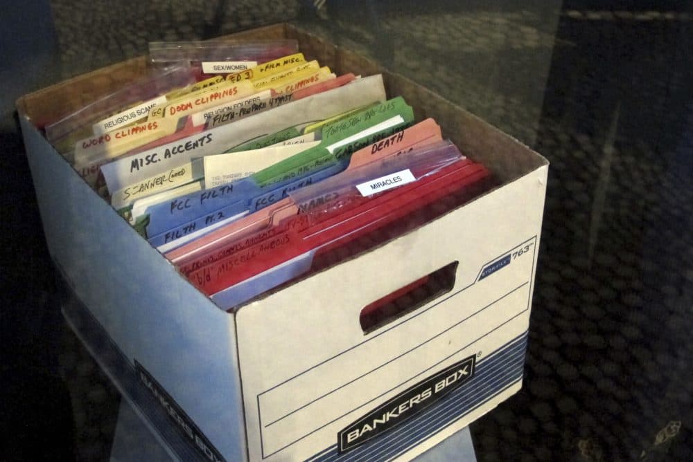 A file box full of notes is part of the George Carlin exhibit at the National Comedy Center in Jamestown, N.Y. Visitors to the center can explore the late comedian's archives of material, which the center acquired from Carlin's family. (Carolyn Thompson/AP)