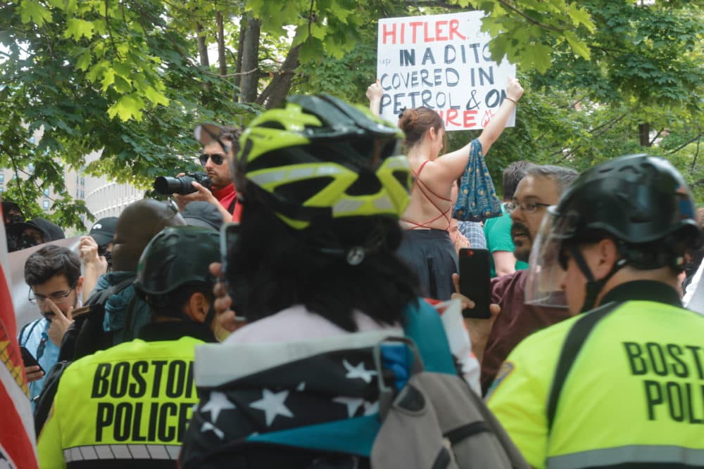 Boston police set up a bicycle perimeter around protesters and counterprotesters during a &quot;free speech&quot; rally in Boston. (Quincy Walters)
