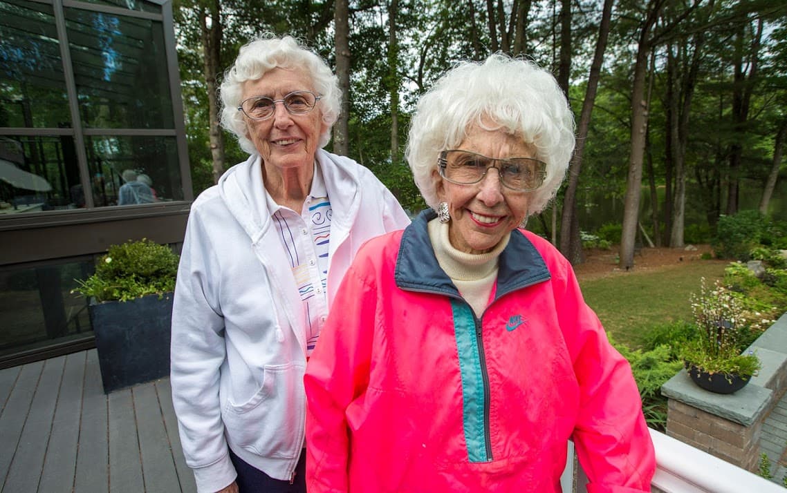Former All-American Girls Professional Baseball League players Shirley Burkovich, left, and Maybelle Blair. (Jesse Costa/WBUR)