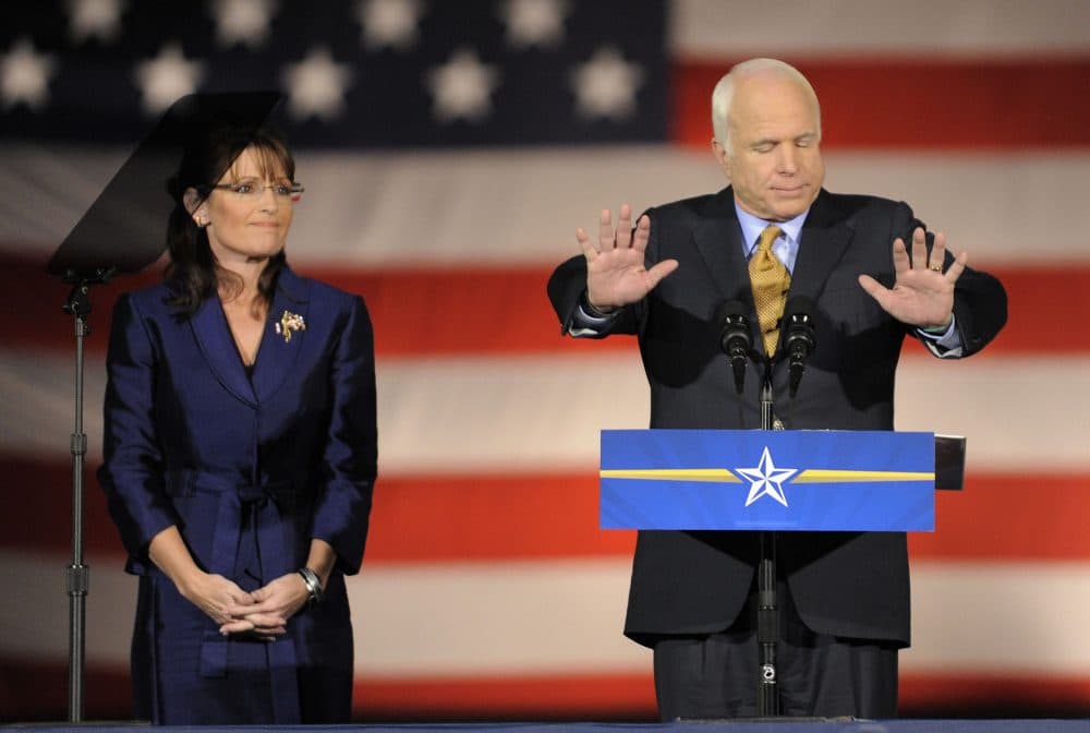 Sen. John McCain, right, is joined by Gov. Sarah Palin, R-Alaska, during a rally with supporters on election night in Phoenix, Tuesday, Nov. 4, 2008. (Chris Carlson/AP)