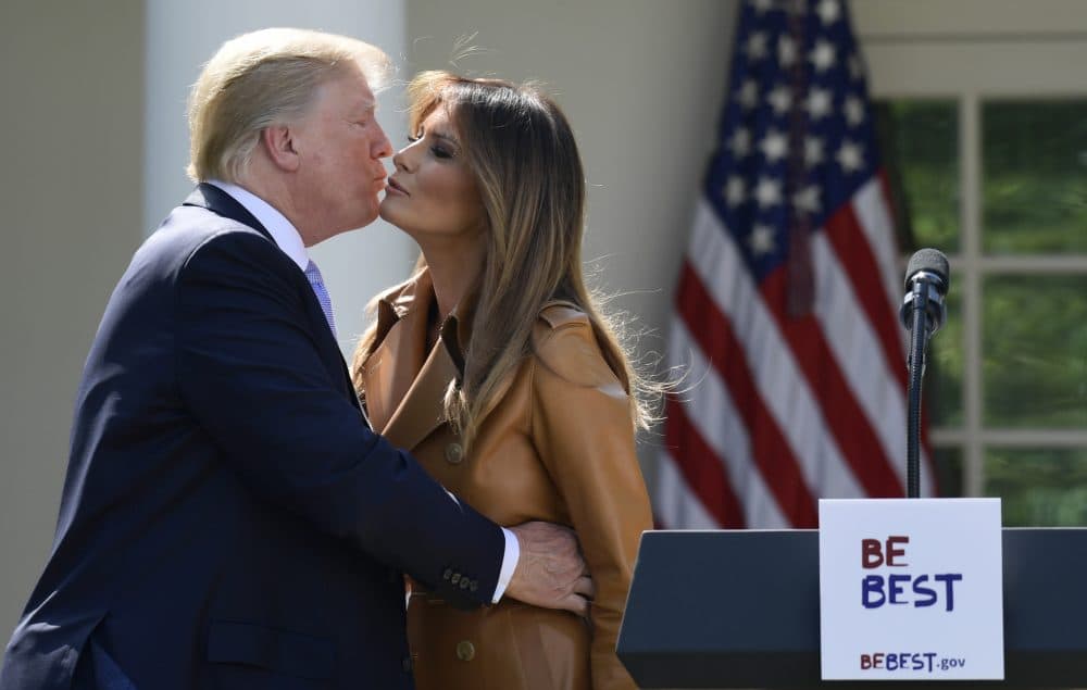 President Trump kisses First Lady Melania Trump following an event where Melania Trump announced her initiatives in the Rose Garden of the White House on May 7, 2018. (Susan Walsh/AP)