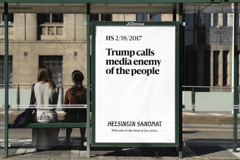 A poster is displayed by Finnish newspaper Helsingin Sanomat at a stop for public transport in Helsinki, Sunday, July 15, 2018. (Markus Schreiber/AP)