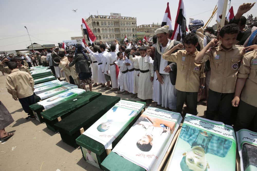 Yemeni people attend the funeral of victims of a Saudi-led airstrike, in Saada, Yemen, Monday, Aug. 13, 2018. Yemen's shiite rebels are backing a United Nations' call for an investigation into the airstrike in the country's north that killed dozens of people including many children. (Hani Mohammed/AP)