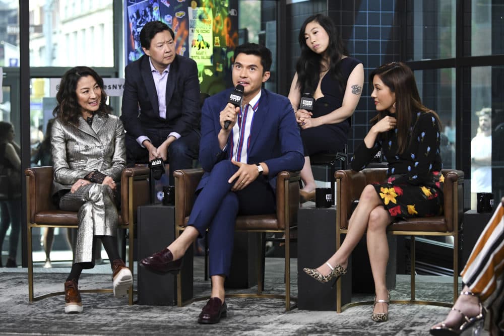 Actors Michelle Yeoh, left, Ken Jeong, Henry Golding, Awkwafina and Constance Wu participate in the BUILD Speaker Series to discuss the film "Crazy Rich Asians" at AOL Studios on Tuesday, Aug. 14, 2018, in New York. (Evan Agostini/Invision/AP)