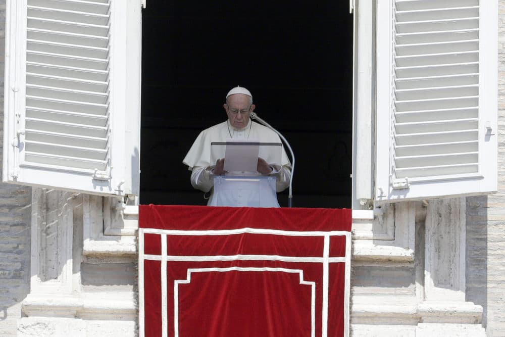In this Sunday, Aug. 19, 2018 file photo, Pope Francis prays for the victims of the Kerala floods during the Angelus noon prayer in St. Peter's Square, at the Vatican. Pope Francis has issued a letter to Catholics around the world condemning the &quot;crime&quot; of priestly sexual abuse and cover-up and demanding accountability, in response to new revelations in the United States of decades of misconduct by the Catholic Church. (Gregorio Borgia/AP)