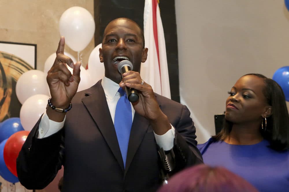Andrew Gillum with his wife, R. Jai Gillum at his side addresses his supporters after winning the Democrat primary for governor on Tuesday, Aug. 28, 2018, in Tallahassee, Fla. (Steve Cannon/AP)