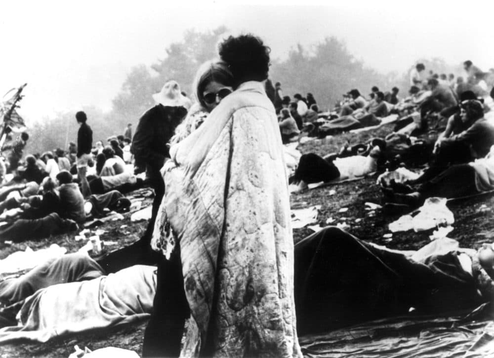 In this August 1969 file photo, a couple hugs during the Woodstock Music and Art Festival in Bethel, N.Y., USA. (AP photo)