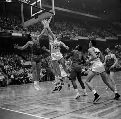 Syracuse Nationals forward Dolph Schayes (left) was a 12-time NBA All-Star. (Peter J. Carroll/AP)