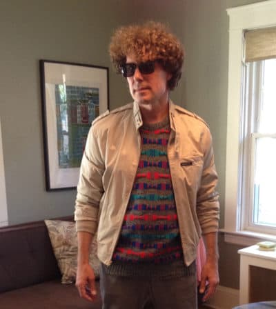 Ethan Gilsdorf puts together his '80s outfit, donning a Members Only jacket. (Courtesy Mary Ann Guillette)