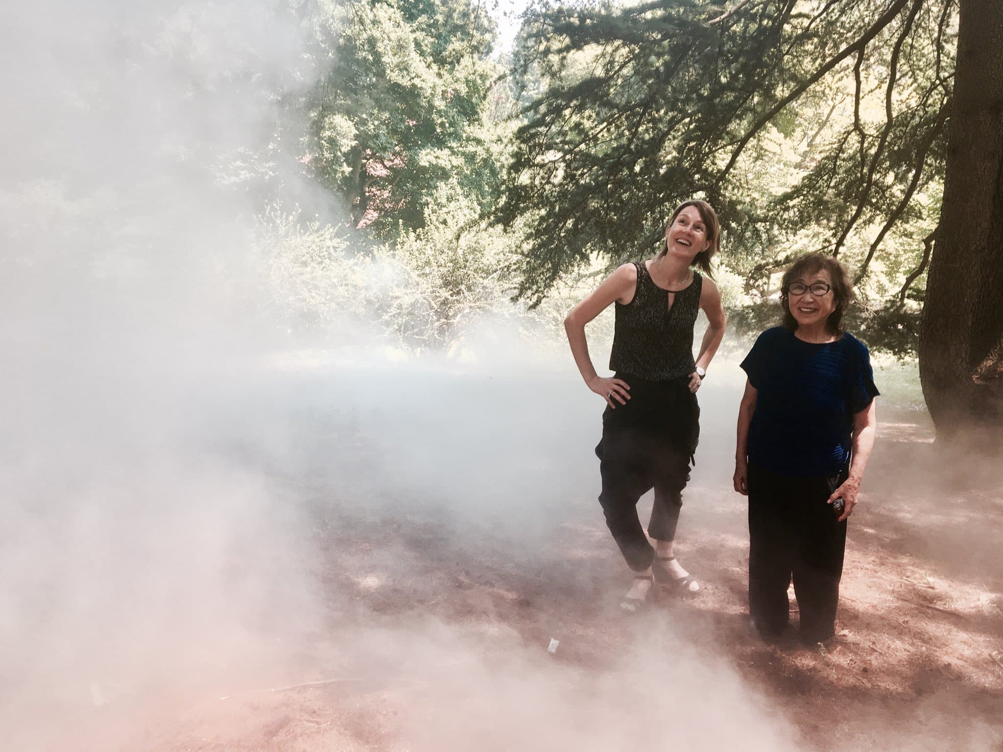 Curator ⁦Jen Mergel⁩ with artist Fujiko Nakaya at the Arnold Arboretum ahead of the FogxFLO opening. (Andrea Shea/WBUR)
