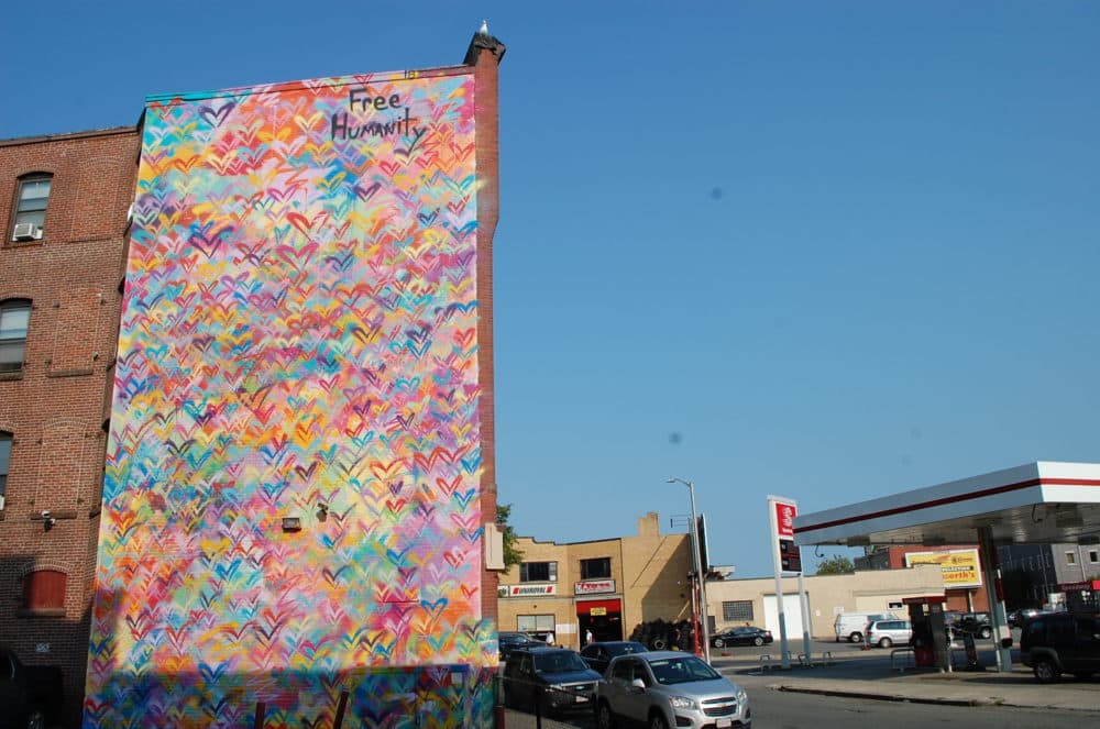 Free Humanity's mural in Lynn for the Beyond Walls Mural Festival. (Dana Forsythe for WBUR)