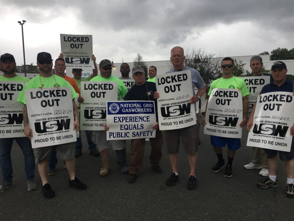 Members of the United Steelworkers arrived at work June 25 to find they had been locked out by the utility. (Bruce Gellerman/WBUR)