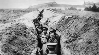 Soldiers lined up in a narrow trench during World War I. (Hulton Archive/Getty Images)