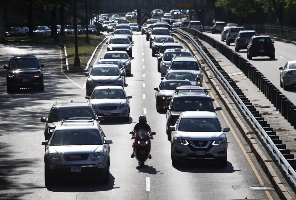 In the heat of the late afternoon, cars crawl along Storrow Drive. (Robin Lubbock/WBUR)