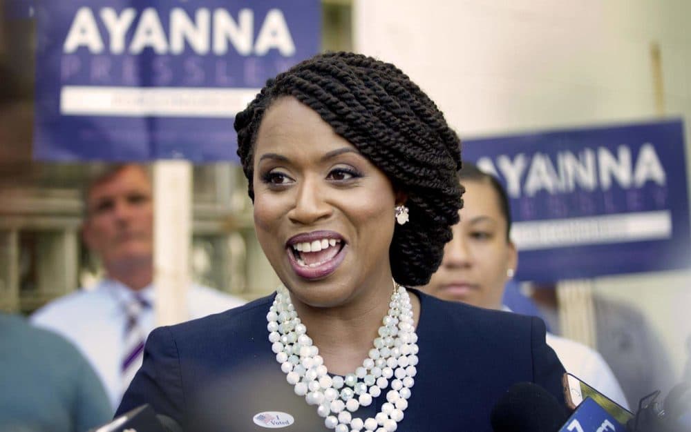 Ayanna Pressley talks with reporters outside the Adams Street Library in Dorchester on Sept. 4, 2018. (Robin Lubbock/WBUR)