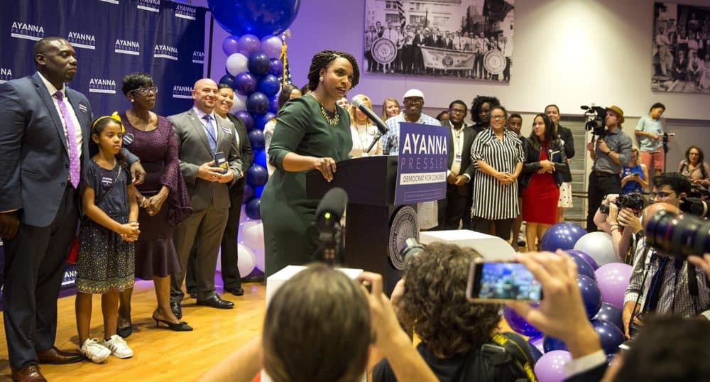Ayanna Pressley talks to supporters celebrating her victory in the 7th district primary election. (Robin Lubbock/WBUR)