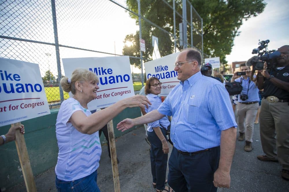 U.S. Rep. Michael Capuano greets supporters outside of Trum Field in Somerville after he voted. (Jesse Costa/WBUR)