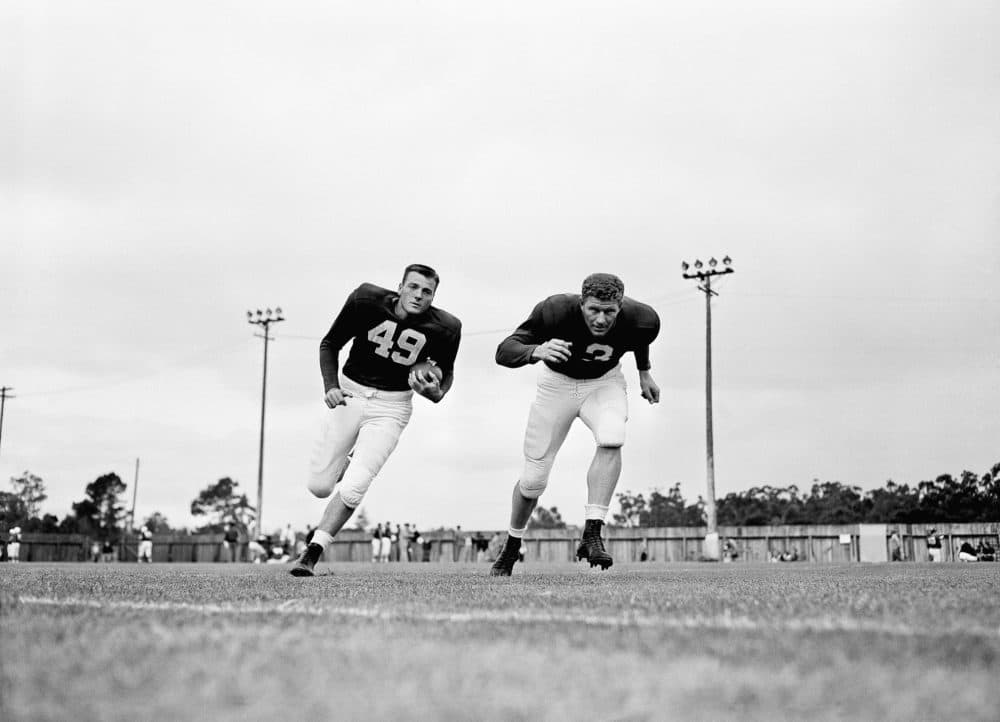 After an eight-year NFL career, Bill McColl (right) became an orthopedic surgeon. (Robert Houston/AP)