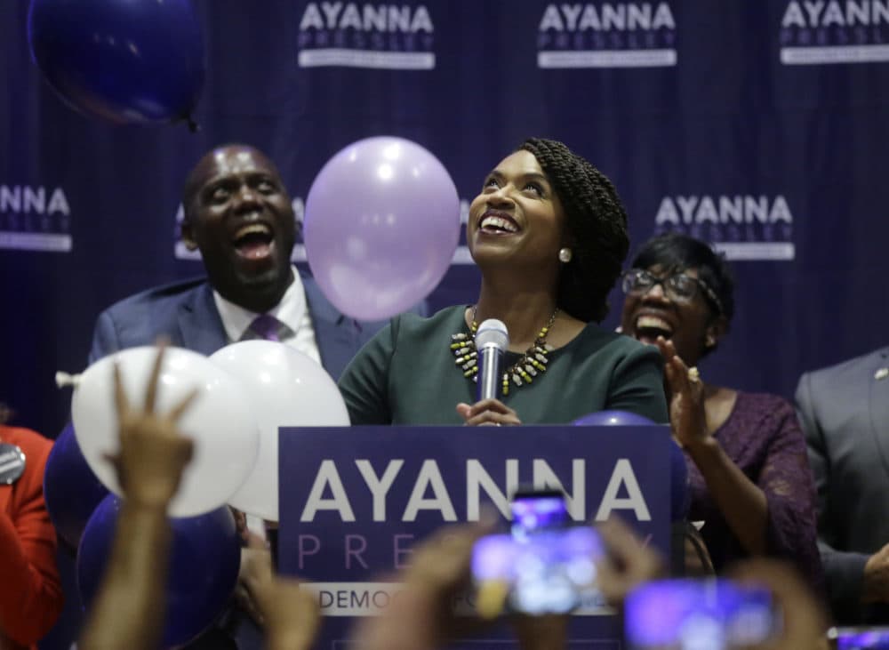Boston City Councilor Ayanna Pressley, center, celebrates victory over U.S. Rep. Michael Capuano, D-Mass., in the 7th Congressional House Democratic primary, Tuesday, Sept. 4, 2018, in Boston. (Steven Senne/AP)