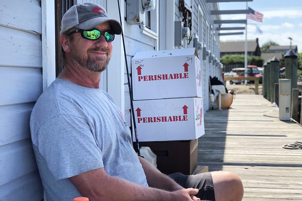 Duane Lynch leads charter fishing tips, runs a café and lobster shack, and works construction on the island. (Max Larkin/WBUR)