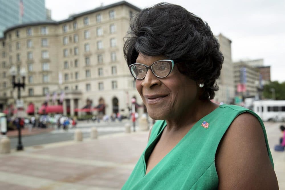 Althea Garrison, who is next in line for Ayanna Pressley's at-large Boston City Council seat, speaks outside Boston Public Library. (Robin Lubbock/WBUR)