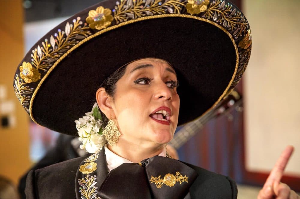 Veronica Robles rehearsing with her mariachi band in East Boston. (Robin Lubbock/WBUR)