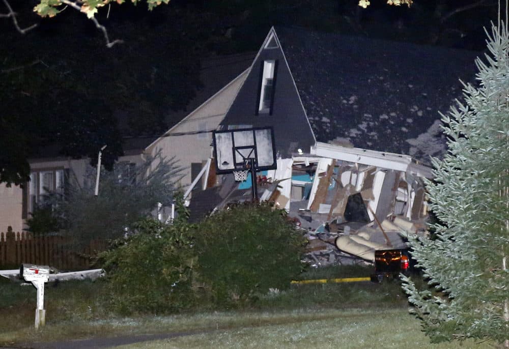 A house is destroyed in Lawrence. A problem with a gas line that feeds homes in several communities north of Boston triggered a series of gas explosions and fires. (Mary Schwalm/AP)