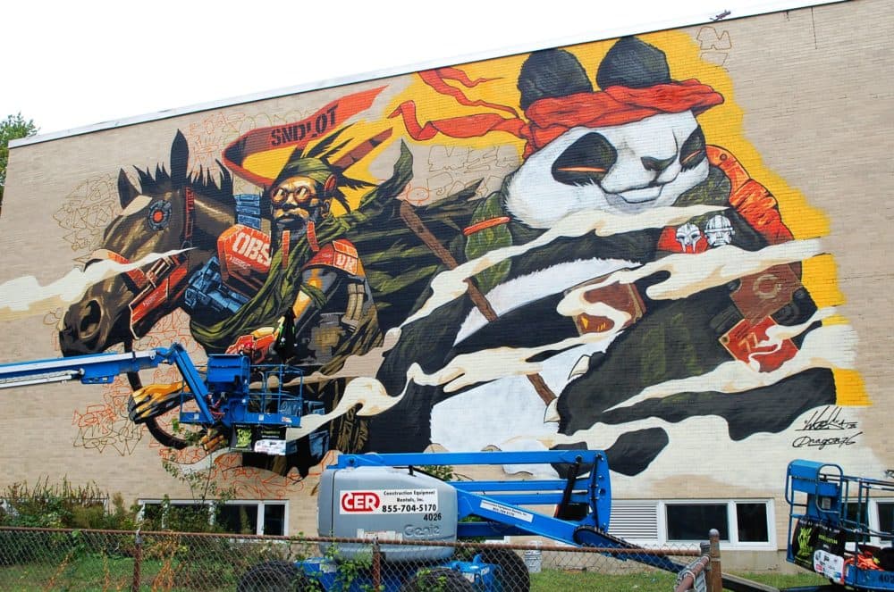 Dragon76 and Woe's mural in Worcester (Dana Forsythe for WBUR)