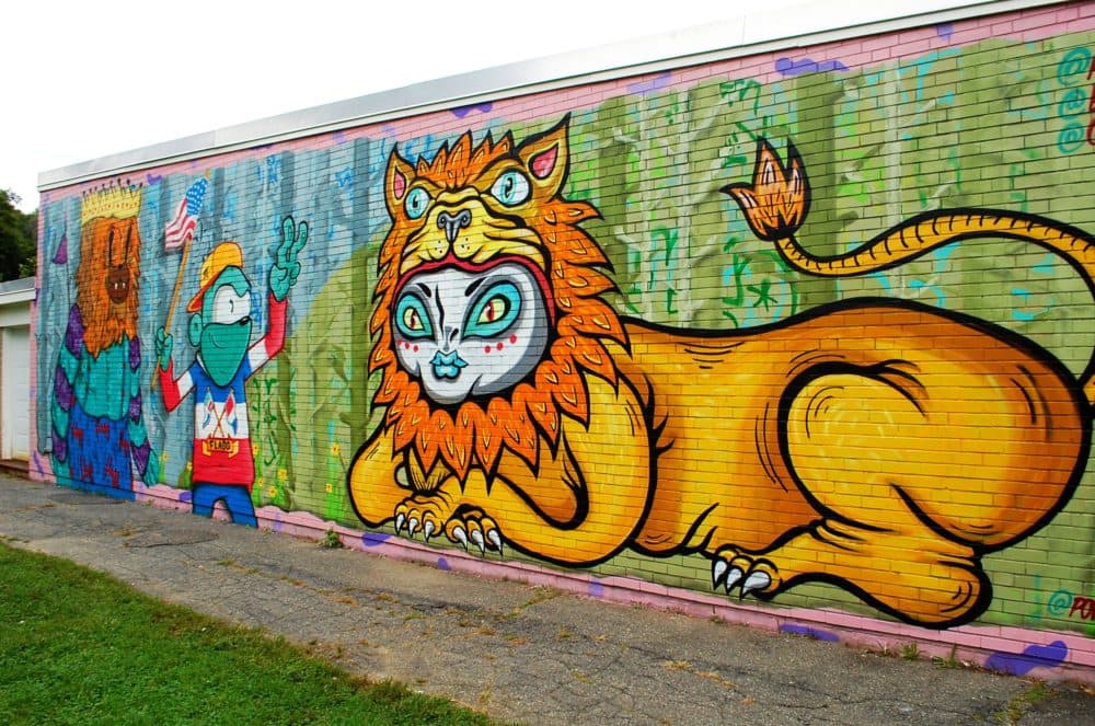 Grace Lang, Ramiro Davaro-Comas and BelowKey's mural in Worcester (Dana Forsythe for WBUR) 