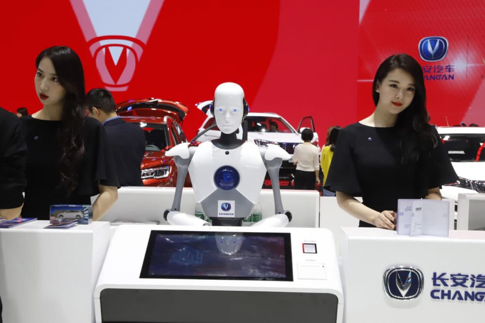 FILE - In this April 26, 2018, file photo, a robot assist receptionist is seen at the booth of a Chinese automaker during the China Auto 2018 show in Beijing, China. Under President Xi Jinping, a program known as &quot;Made in China 2025&quot; aims to make China a tech superpower by advancing development of industries that in addition to semiconductors includes artificial intelligence, pharmaceuticals and electric vehicles. (AP Photo/Ng Han Guan, File)