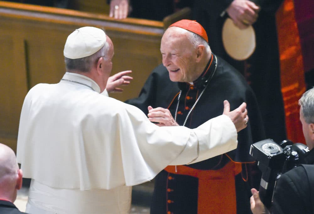 In this Sept. 23, 2015 file photo, Pope Francis reaches out to hug Cardinal Archbishop emeritus Theodore McCarrick at the Cathedral of St. Matthew the Apostle in Washington. (Jonathan Newton/The Washington Post via AP, Pool, File)