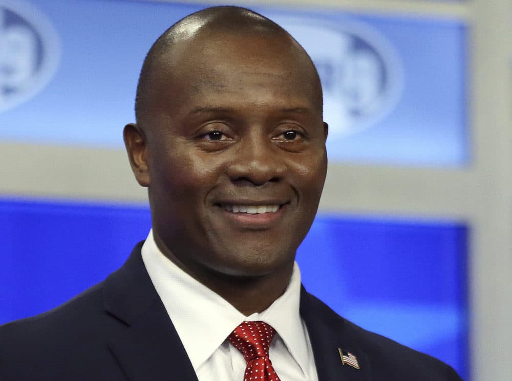 In this Sept. 6 file photo, Eddie Edwards, Republican hopeful for New Hampshire's 1st Congressional District, smiles during a debate at St. Anselm College in Manchester, N.H. Edwards won the Republican primary on Tuesday. (Elise Amendola/AP)