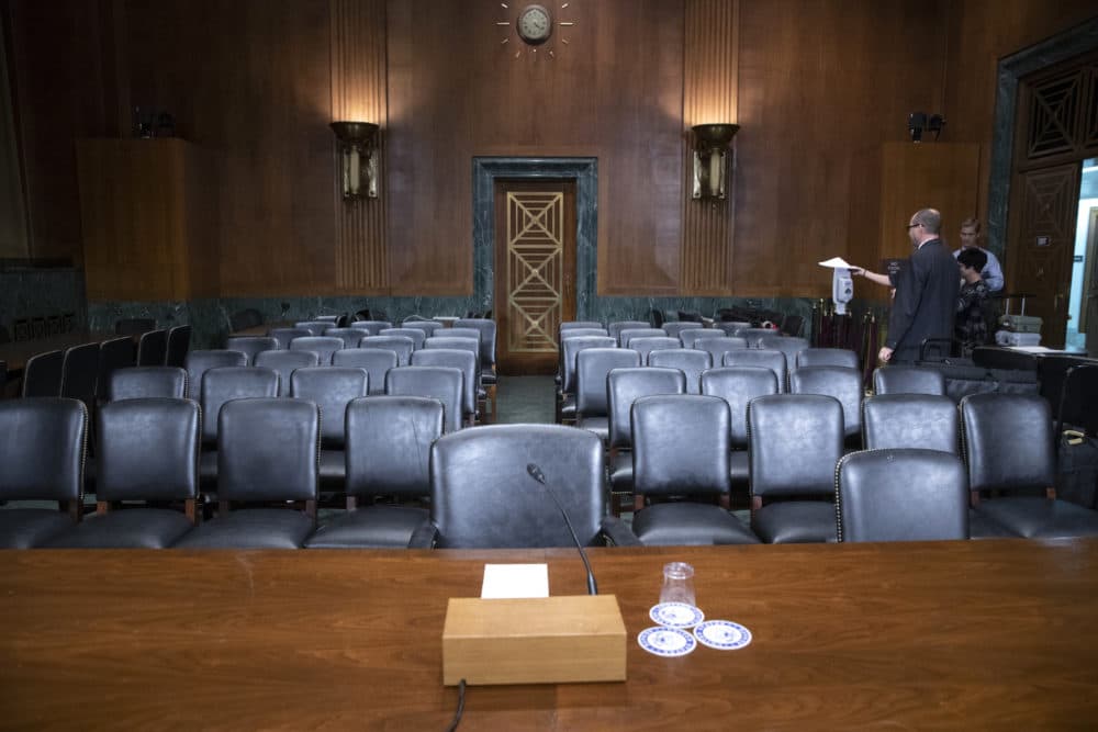 The Senate Judiciary Committee hearing room is prepared for Thursday's planned testimony from Christine Blasey Ford on Capitol Hill in Washington, Wednesday, Sept. 26, 2018. (J. Scott Applewhite/AP)