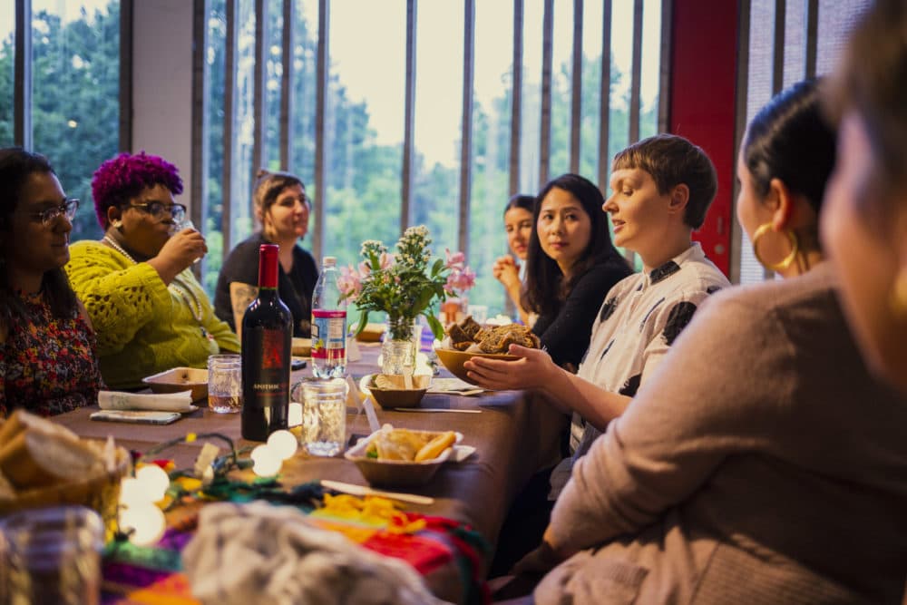 The group at Comida Casera sharing anecdotes and dishes from the women in their lives (Courtesy Mel Taing)