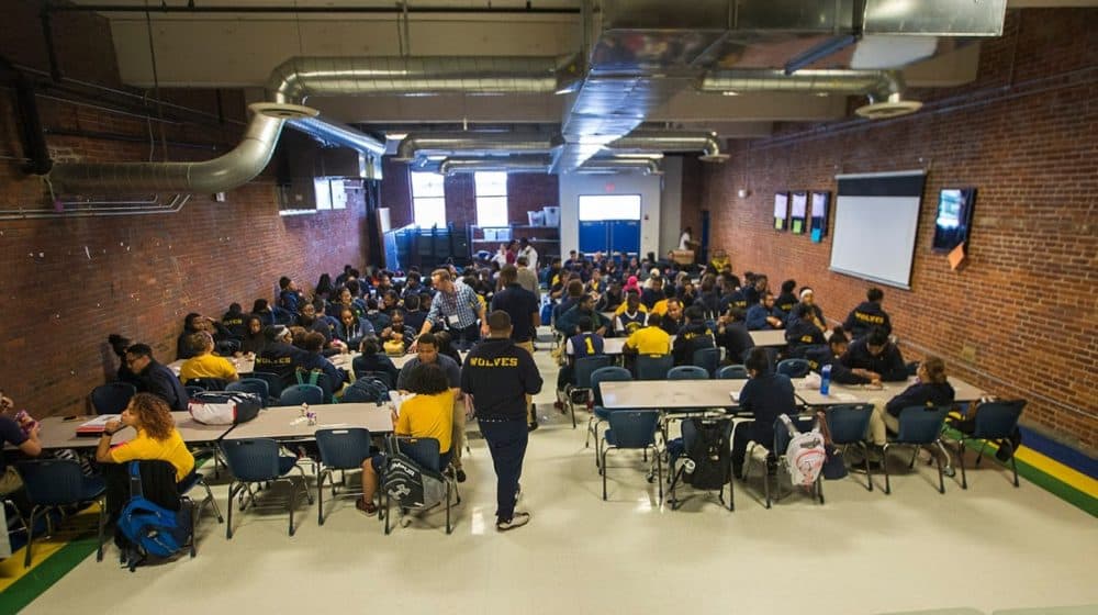 The largest room at Roxbury Prep High School's Maywood Street campus, at lunchtime. It can only fit half of a single class of students at a time. (Jesse Costa/WBUR)