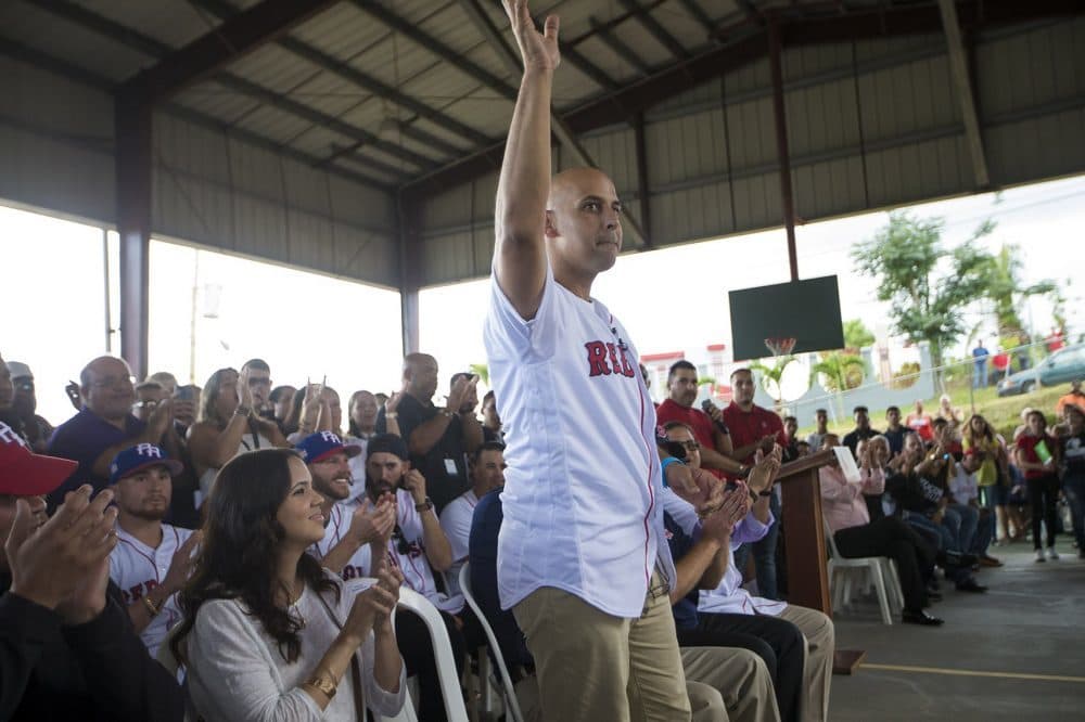 During a relief trip in early 2018, Red Sox manager Alex Cora gets a hometown hero's welcome at La Mesa Sports Complex in Caguas. (Jesse Costa/WBUR)