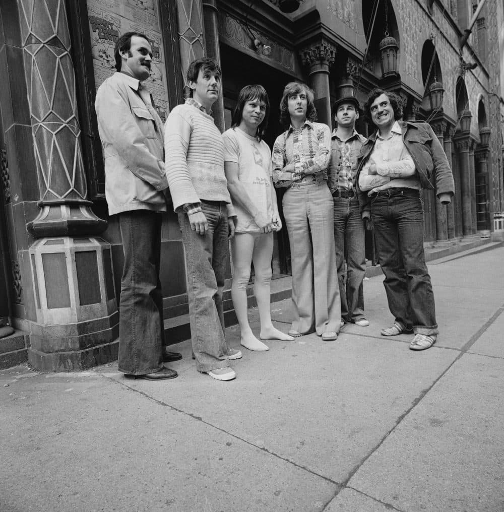 Monty Python members pose outside the City Center building in New York in 1976. From left to right: John Cleese, Michael Palin, Terry Gilliam, Eric Idle, Terry Jones. (Suzanne Vlamis/AP)