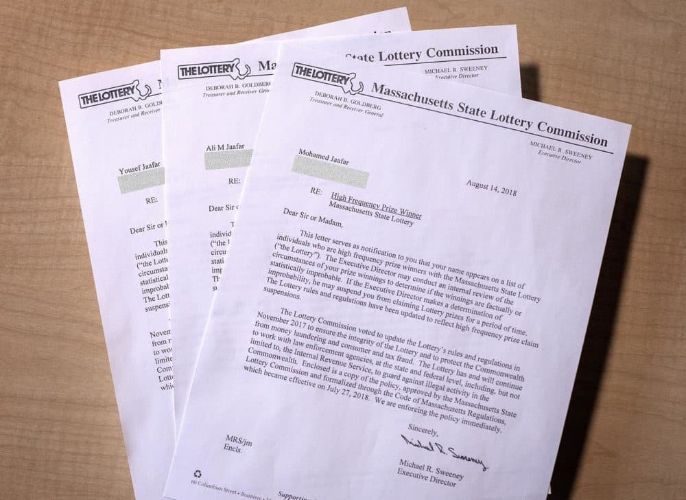 Copies of letters sent by the lottery about its new policy to curb frequent winning to the Jaafars' Watertown home -- a letter each for Ali and his two sons, Mohamed and Yousef. (Robin Lubbock/WBUR)