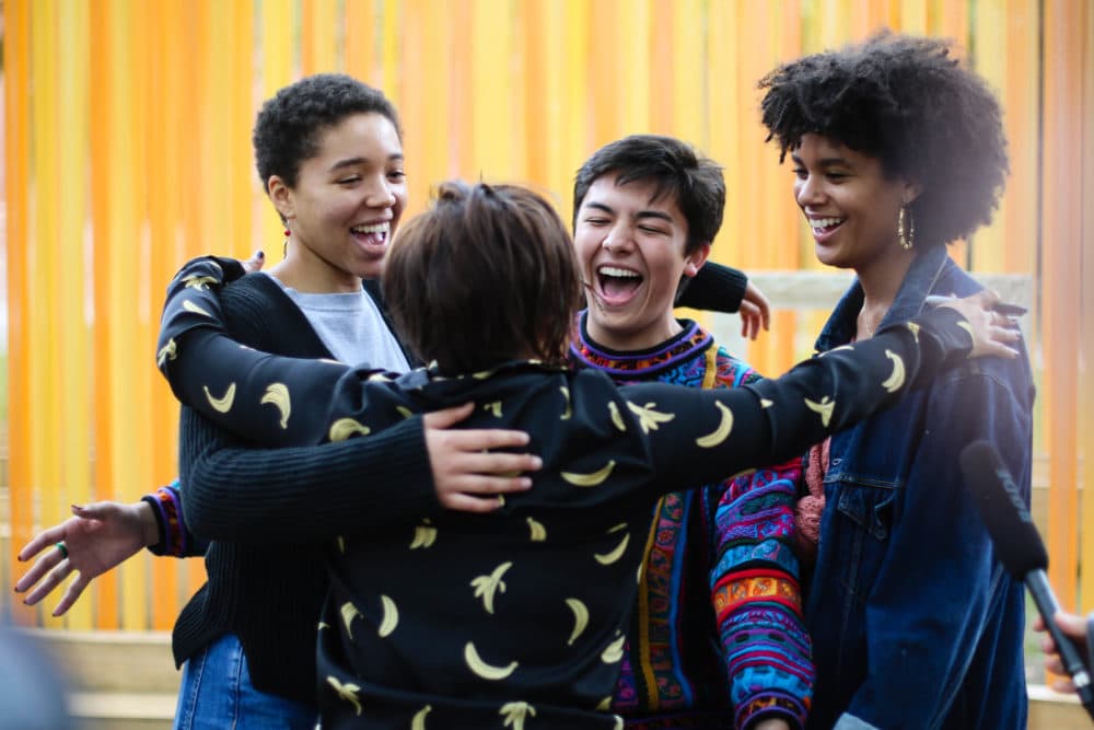 Diana Oh (center) embraces Arianne Banda, Michael Rosegrant, and Mya Ison. (Courtesy A.R.T.)