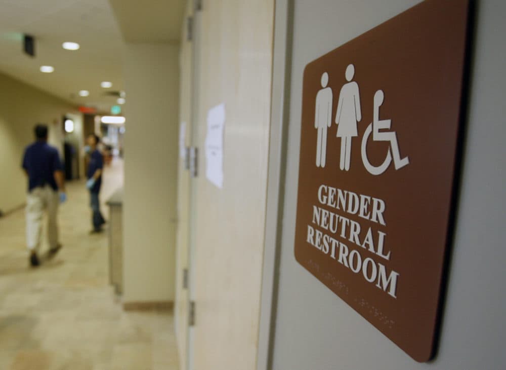 In this Aug. 23, 2007, file photo, a sign marks the entrance to a gender-neutral restroom at the University of Vermont in Burlington, Vt. (Toby Talbot/AP)